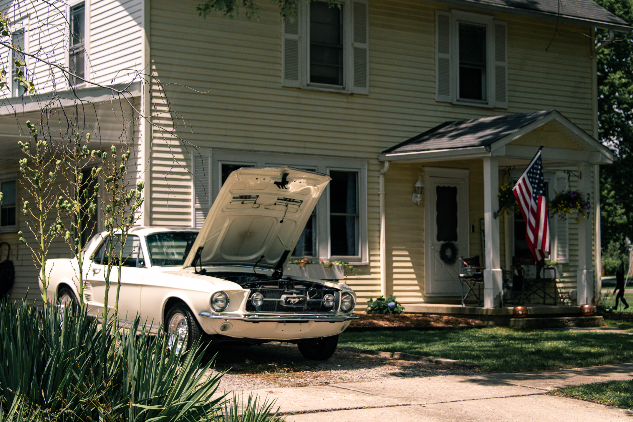 Classic Mustang in driveway photographed by Red Rabbit Photography