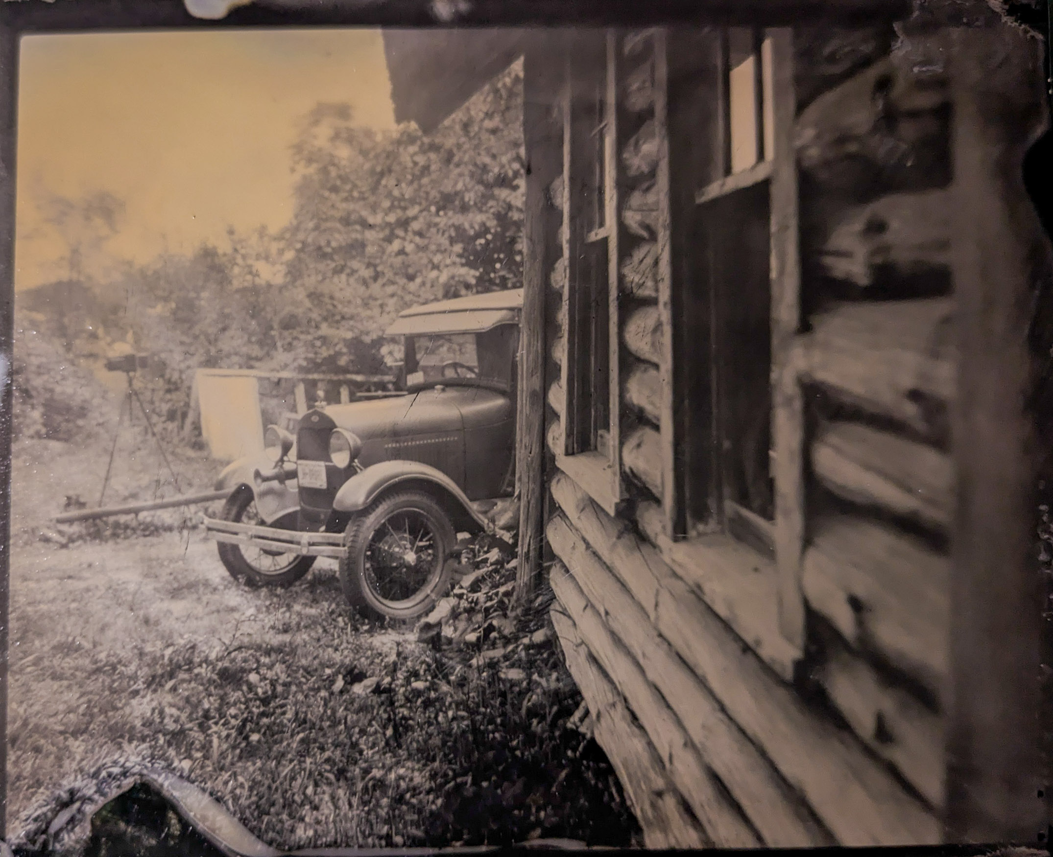 Wet plate photograph of a historic automobile
